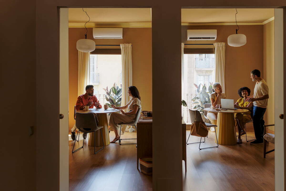 Coworkers engaging in productive discussions and sharing innovative ideas within a contemporary office environment